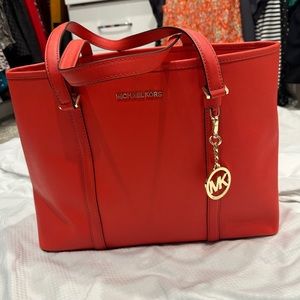 Michael Kors orange leather bag, excellent condition, no flaws